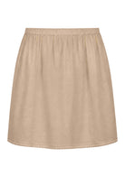 Nude toned slight A-line cotton slip skirt with elasticated waist and picot trim on hem, front view