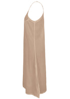 Nude cotton voile slip dress with adjustable spaghetti straps, V-neckline, side splits and a picot trim hem, side view