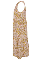 Side view of relaxed fit tiered cotton dress with sleeveless design in cream based floral print