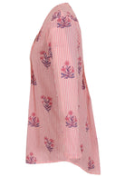 Pink striped white based floral print cotton button through shirt with long sleeves, that is longer at the back
