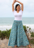 100% rayon super wide legged pants with smocked waistband.