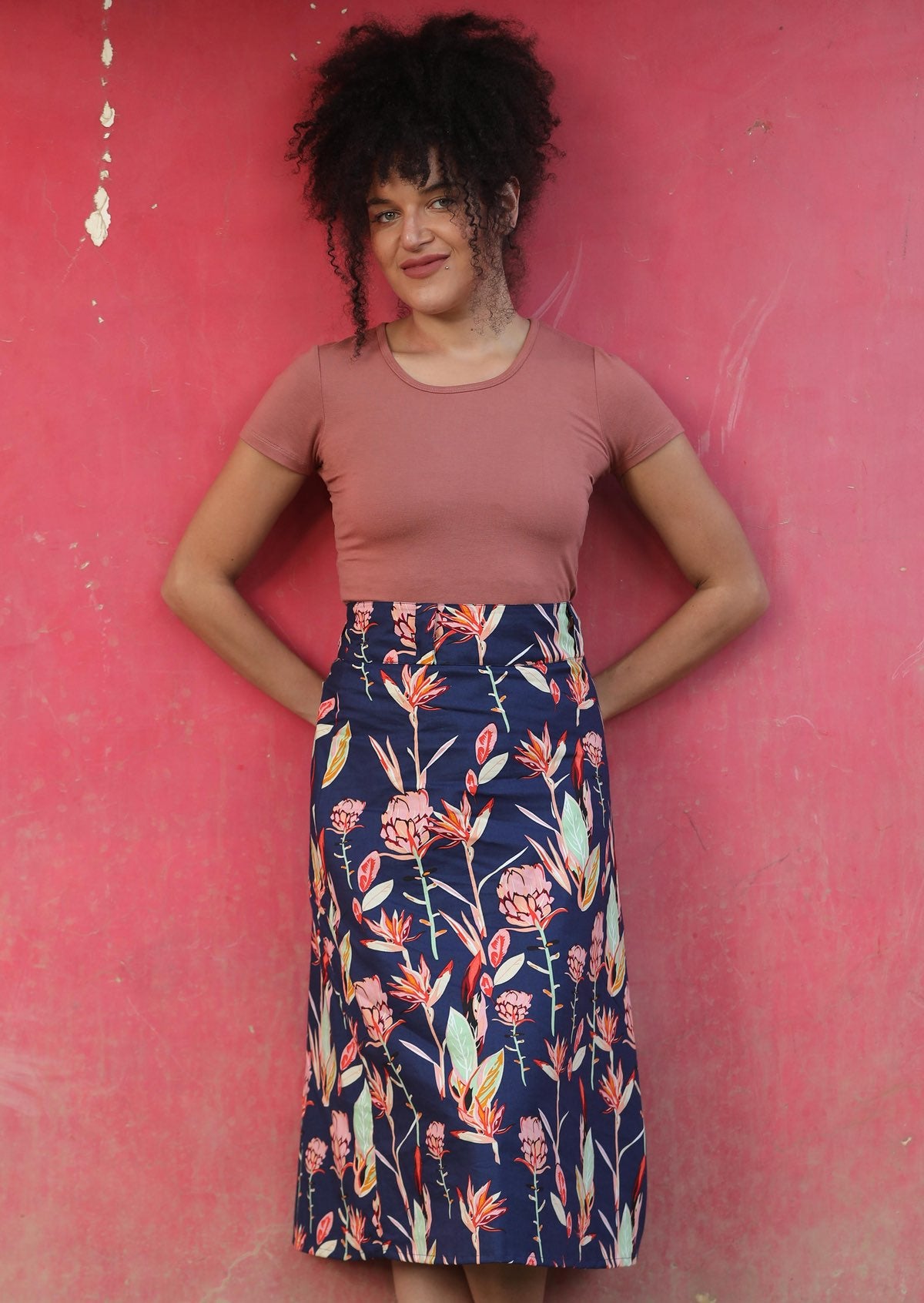 Belt Loop Skirt a-line below the knee length womens skirt with thick waistband and belt loops side zipper 100% cotton navy blue background pink and green toned native floral print | Karma East Australia